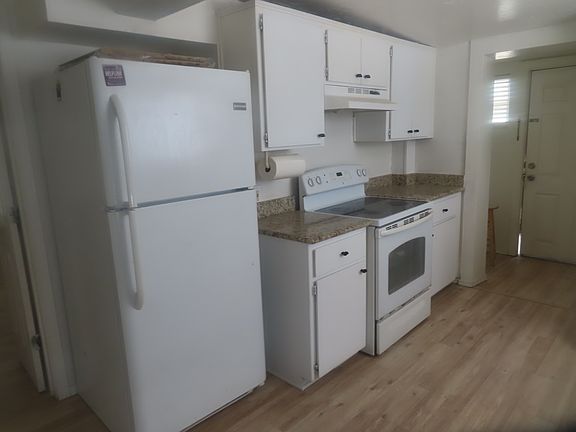 Remodeled Kitchen with Granite Countertops, New Floor, Appliances