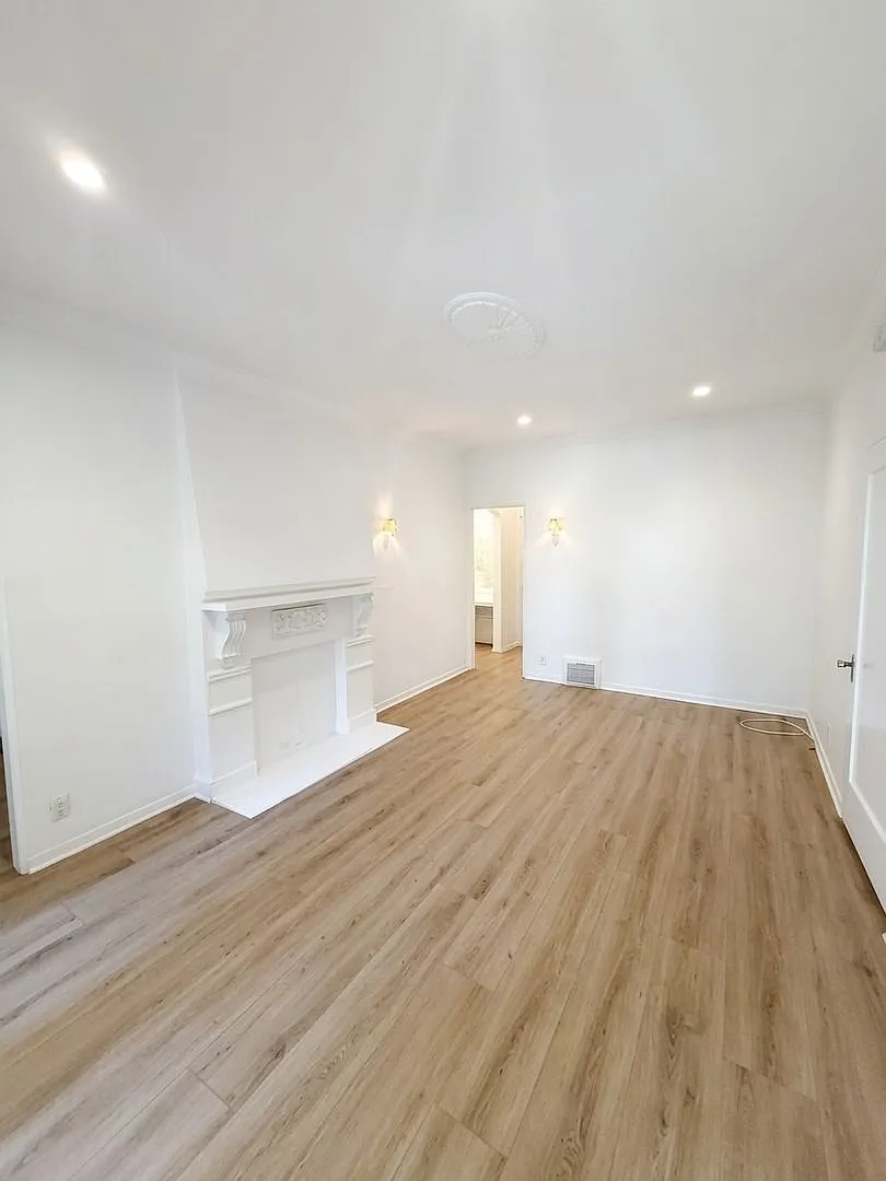 1+1 = Mintage Mediterranean Charm with Modern Updates - Plank Floors, a/c, Decorative Fireplace — Photo 1