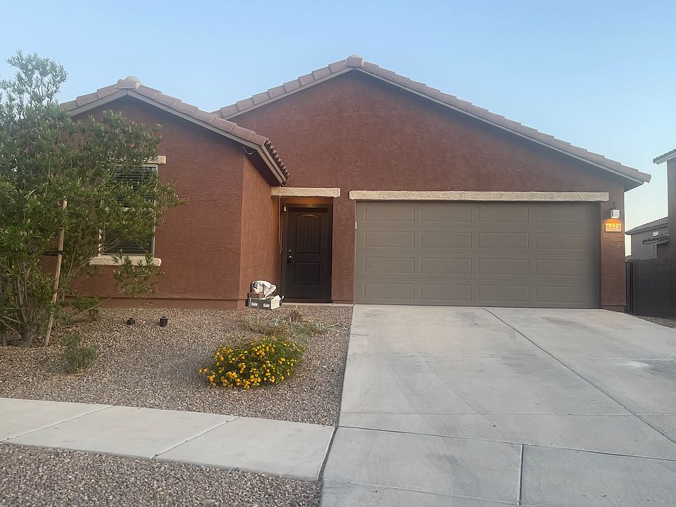 Outside of house with two access gates.