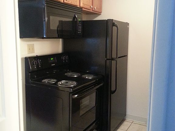Black Appliances with Granite Counter Top