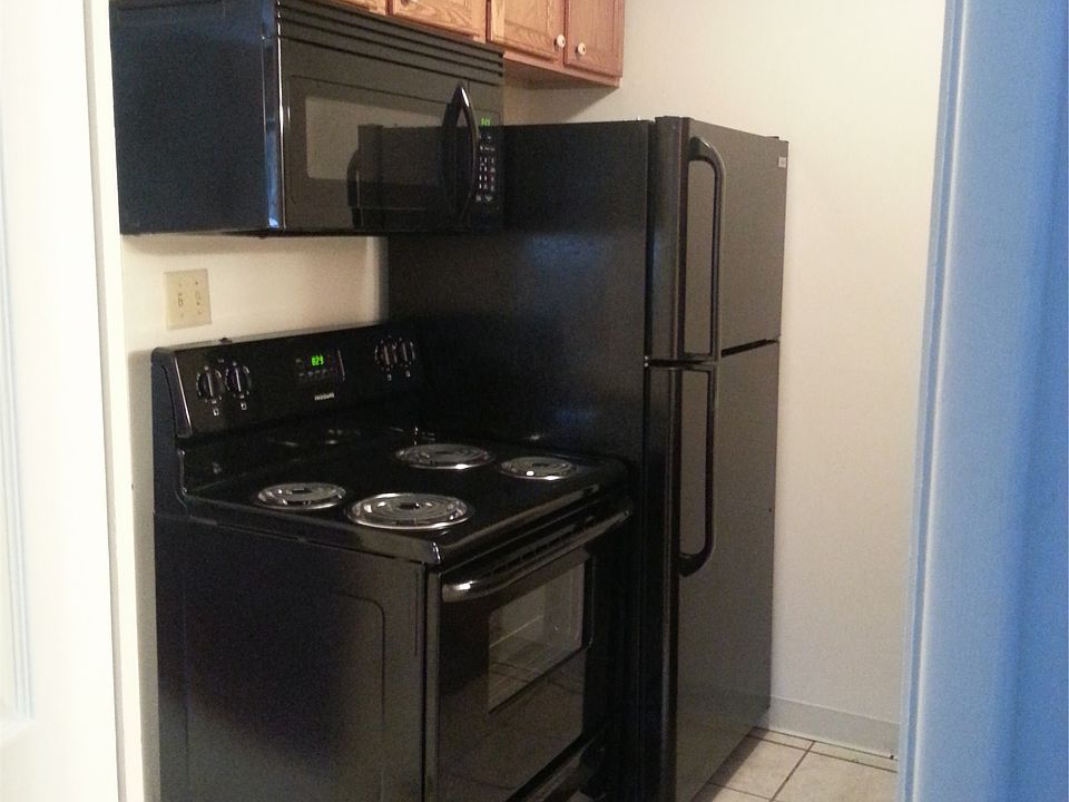 Black Appliances with Granite Counter Top