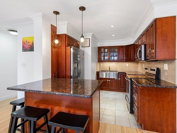 5th image of 166-40 Powells Cove Blvd APT 3B