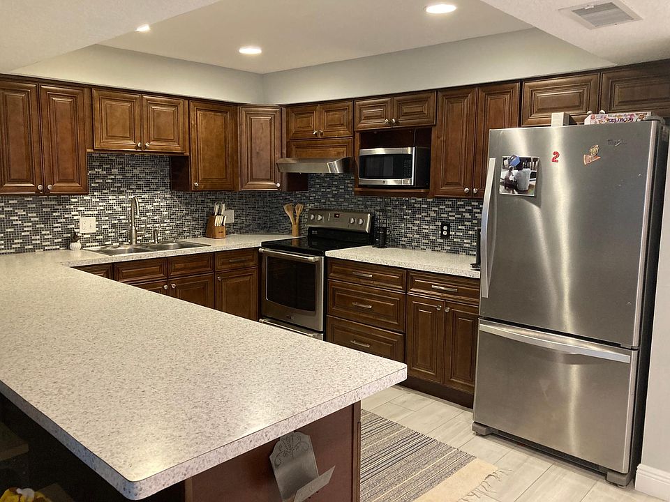 large updated kitchen with plenty of cabinet space