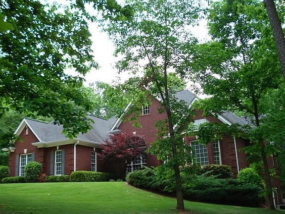 View of front of home and beautiful acreage