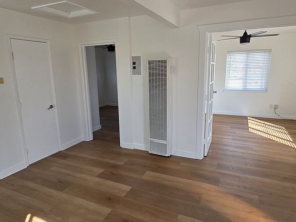 View of flex room from Living Room with doors open