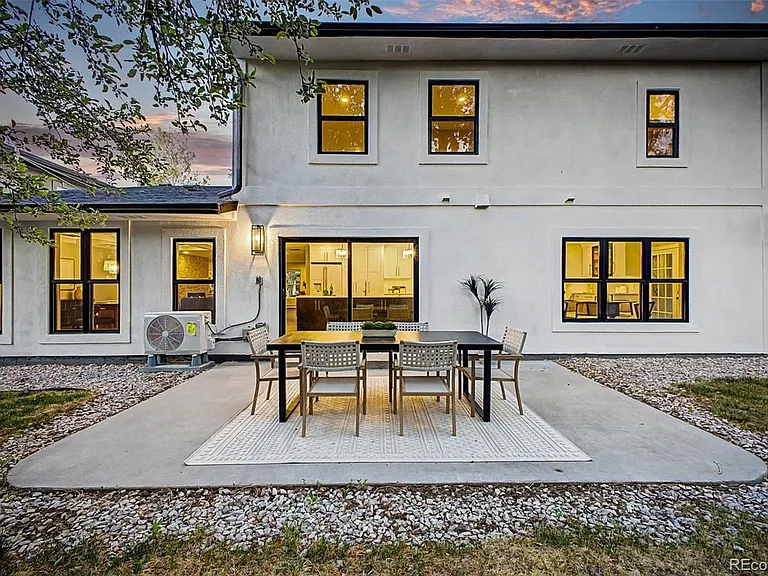 Backyard with 2 patio areas, connected to kitchen for perfect indoor-outdoor experience. Ideal for entertaining!