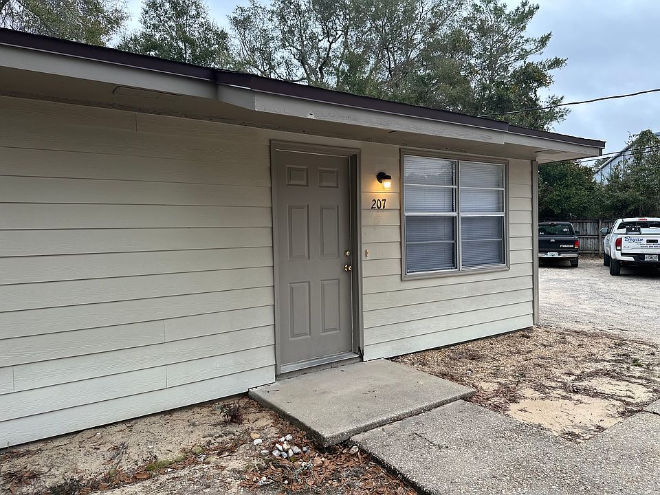 Outside and front entrance. Also back entrance.