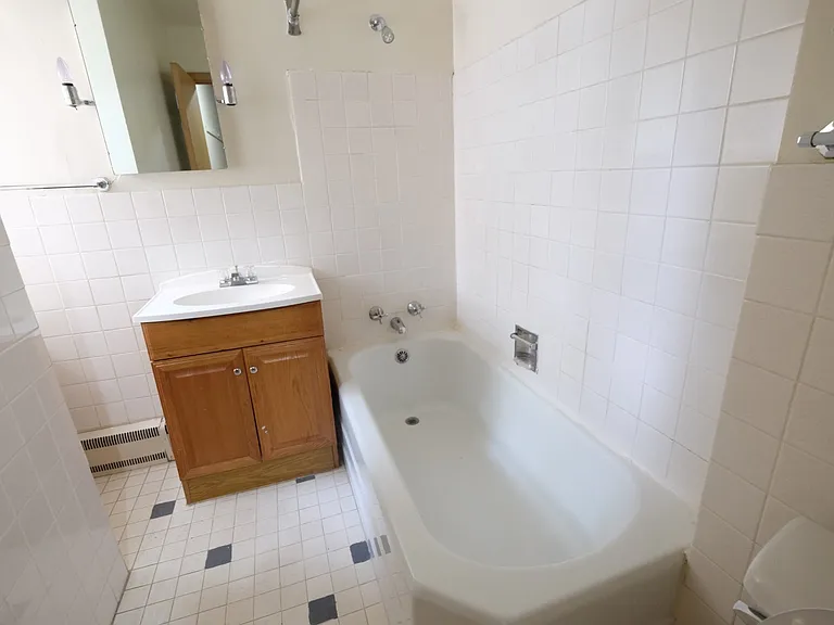 Welcome to Central Lakes of Uptown, where modern comfort meets stylish living. This elegant bathroom features sleek fixtures and a serene atmosphere, perfect for relaxation. Explore your new home today and schedule a tour!