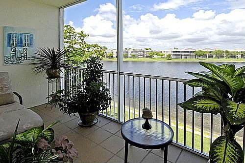 view the sunsets over the wide water views from your screened balcony