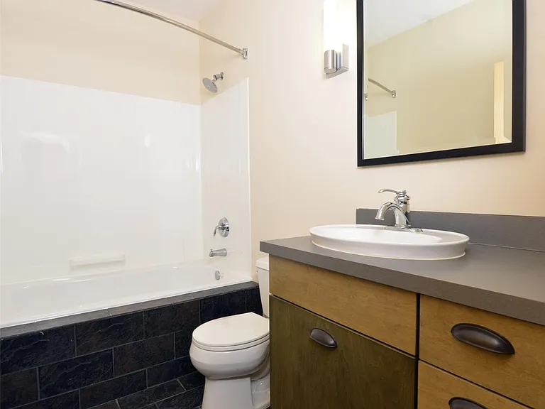 all baths have soaking tubs, slate floors