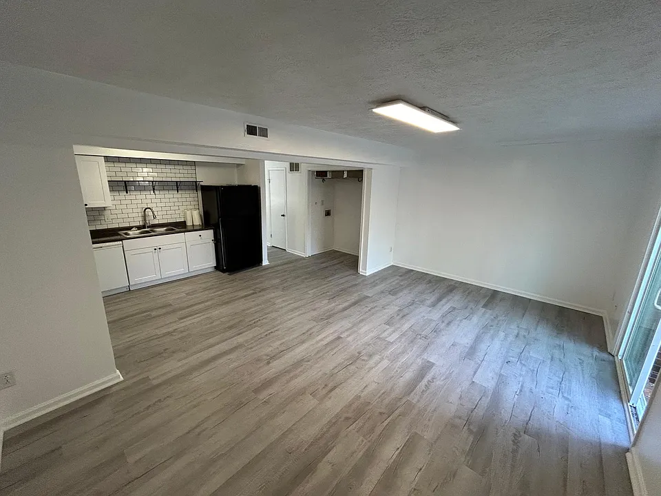 View From the back room looking into the kitchen and laundry closet.