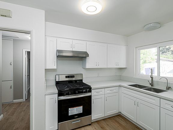 Updated kitchen with new stove, stainless steel sink with filtered drinking water