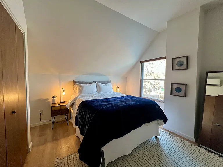 Bedroom #1 - Queen bed, large reach in closet, TV, full length mirror, heat pump for heat/ac