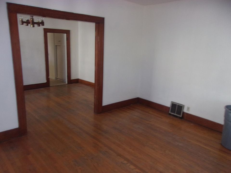 View from Living room through dining room to kitchen entrance door LR 12'6" x 15'6" Dining Rm 10'6" x 15'6"