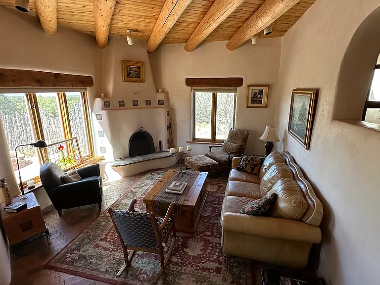 Living room with kiva fireplace