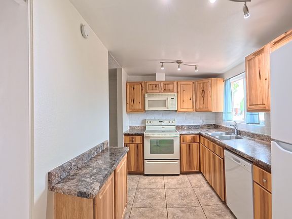 4th image of 6982 E 42nd St
