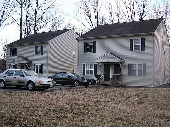 Another front view. 12 paved parking spaces