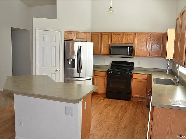 6123 S Quemoy Way — Photo 6