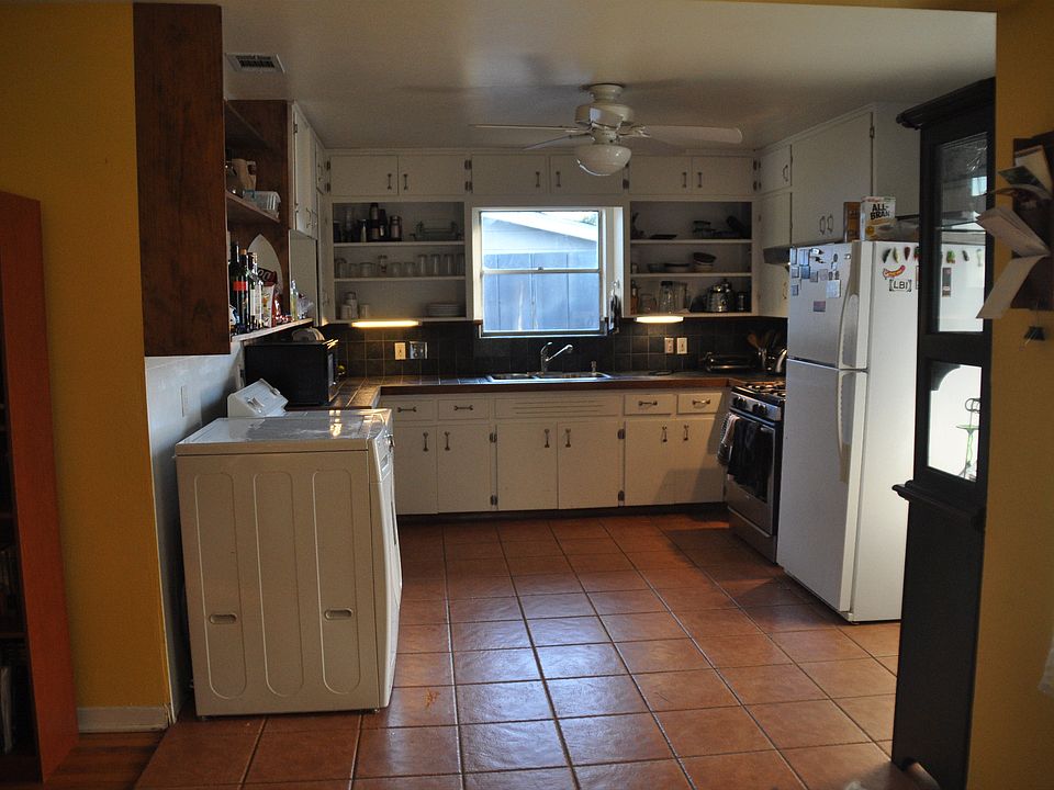 Kitchen has gas stove, dishwasher, extractor, fridge and all