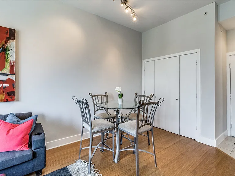 Dining area, with full size, side by side washer and dryer area.
