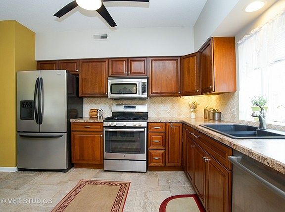 5th image of 3401 Wellington Ct Unit 101
