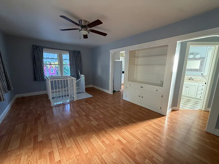 Take the spiral staircase down to the first floor bedroom/flexspace.