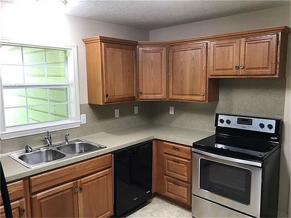 Kitchen has plenty of cabinets and counter space