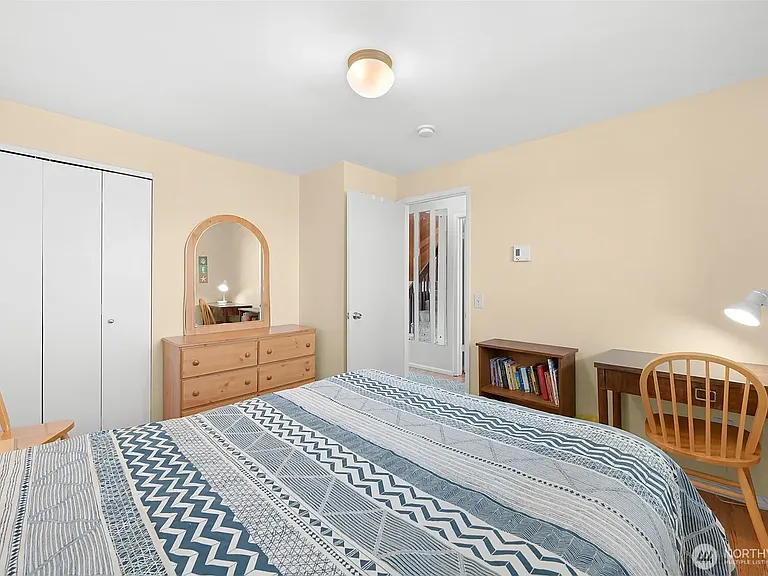 Queen bed, chest of drawers, good size closet.