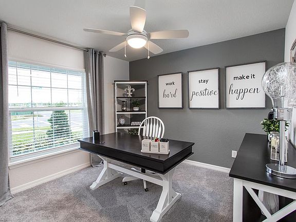Flexible front bedroom - New home for sale in Lake Wales, FL. Photo showcases a home with similar fi