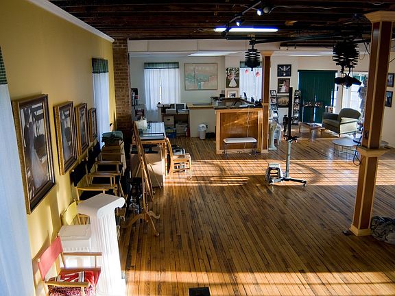 Photography business available for purchase with building.