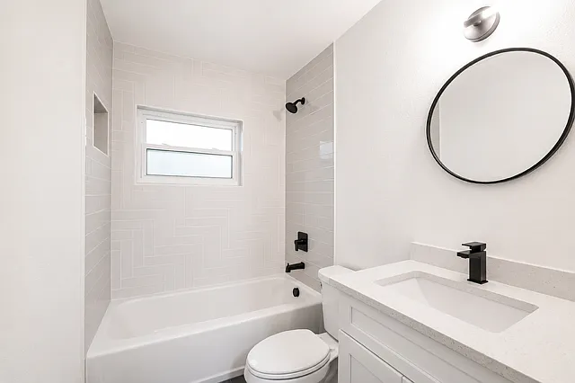 Secondary bathroom featuring a bathtub and shower.