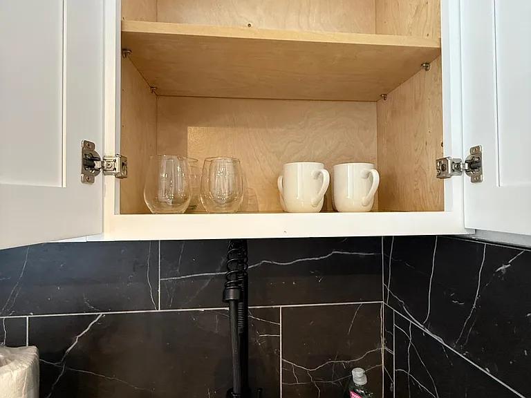 Includes glassware and mugs for your convenience.