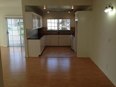kitchen - Open floor plan and view of mountains. Granite counters.