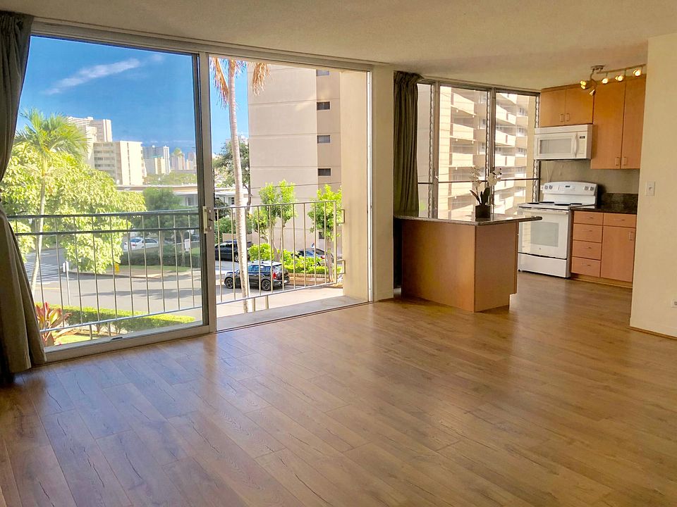 Open Floor Plan Living Room with laminated flooring
