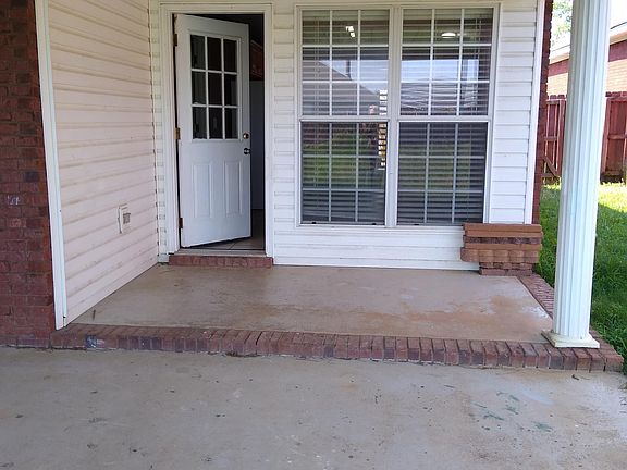 Back of house - patio with ceiling fan