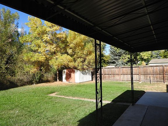 private backyard with storage shed