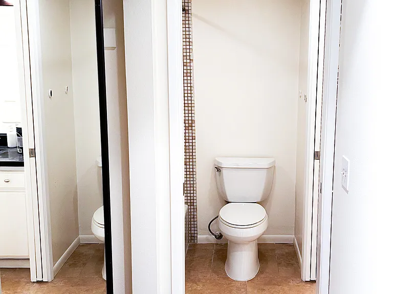 Second bathroom from second bedroom (closet on left)