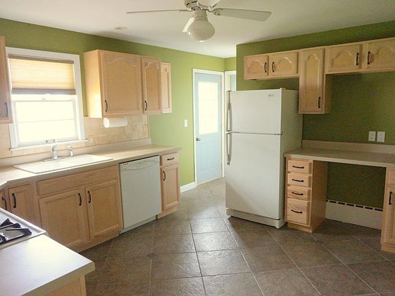 custom maple cabinets, ceramic tile floor, dishwasher
