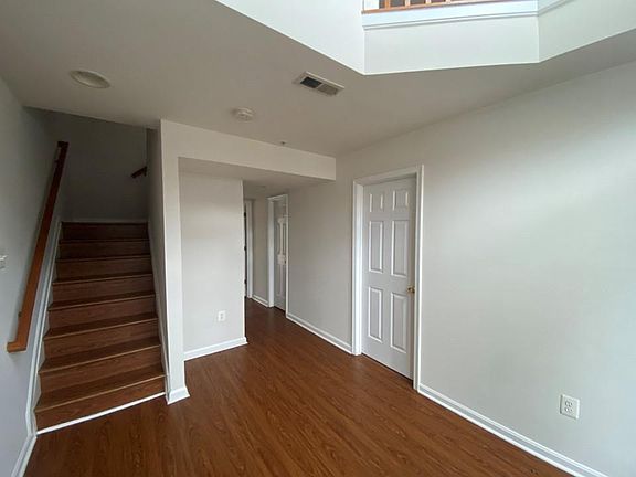 Main foyer with stairwell leading to second floor. The first door to the right opens to a lovely office.