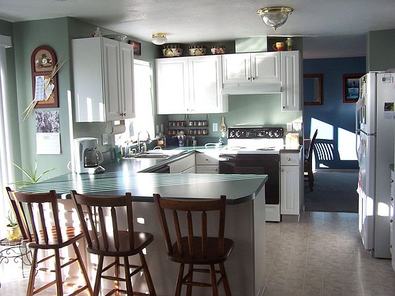 Kitchen - we added the bar to increase counter space and functionality