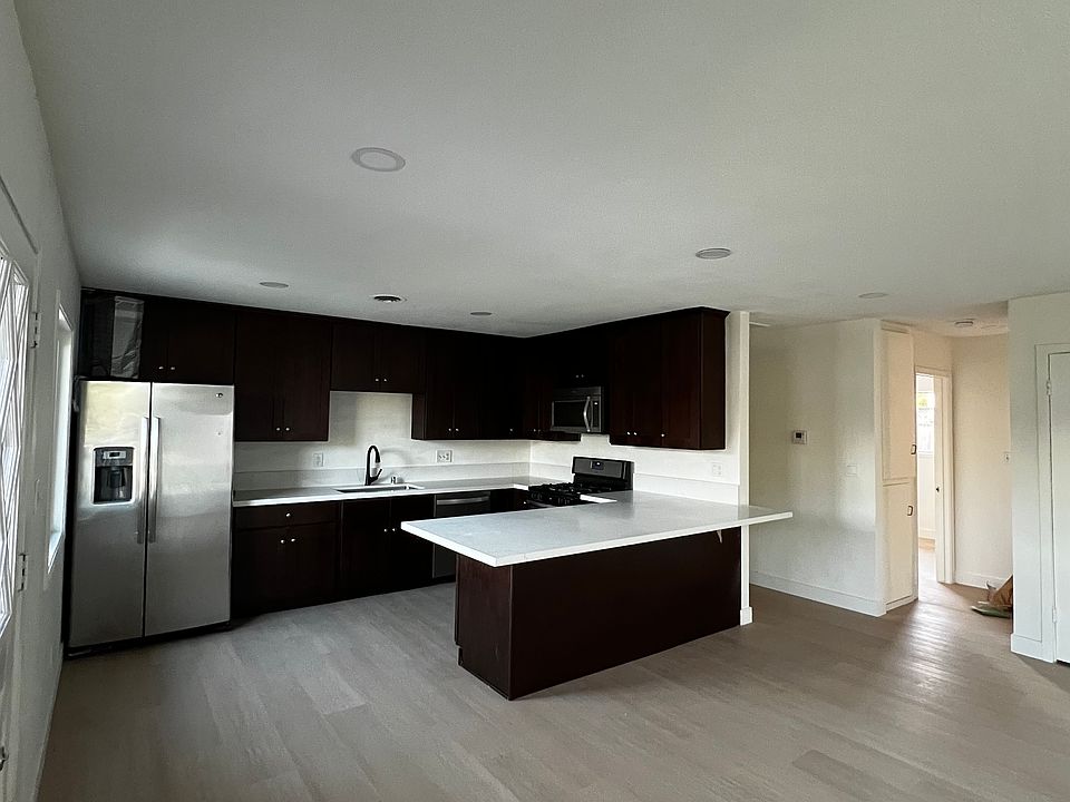 Kitchen opens up into living room