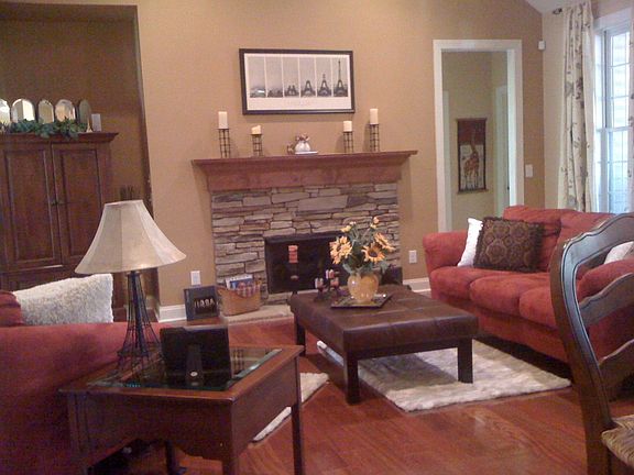 Main living space with vaulted ceilings and custom fireplace