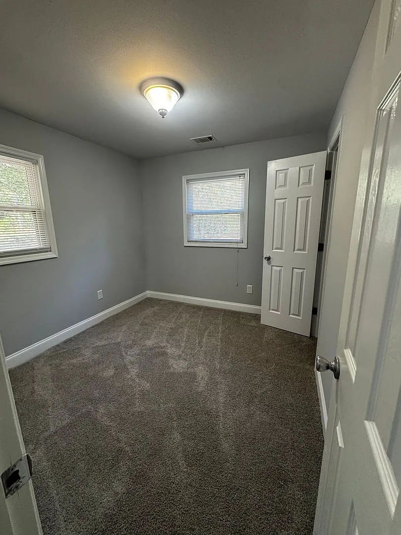 Freshly Updated 4-Bedroom Brick Home with Spacious Yard! — Photo 2