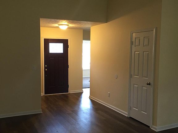 wood looking floor in foyer and family room.