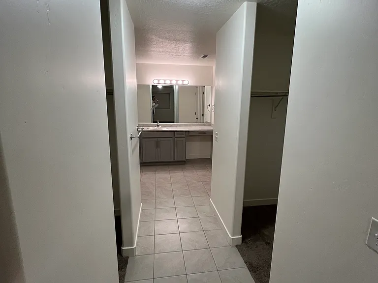 Entrance to walk-in closet and master bathroom.