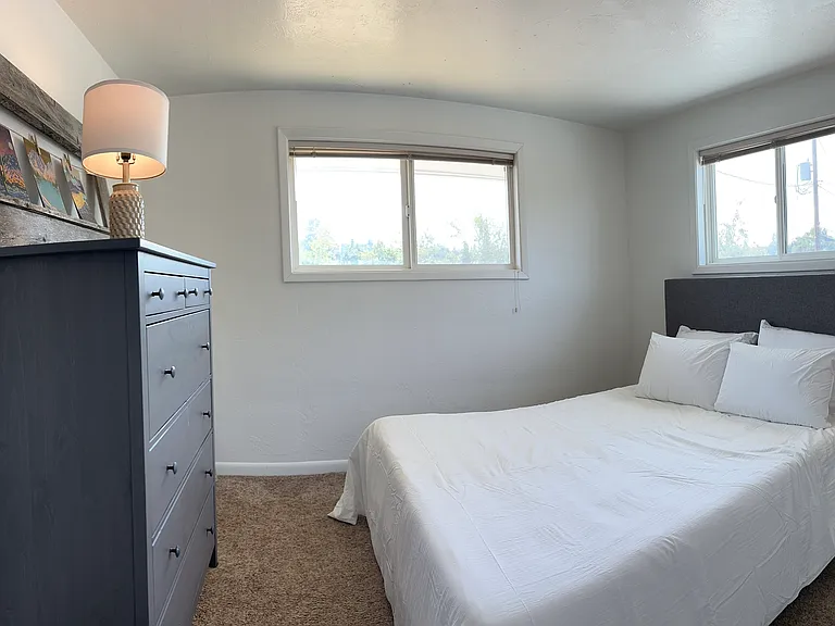 Second bedroom with queen bed and full closet.