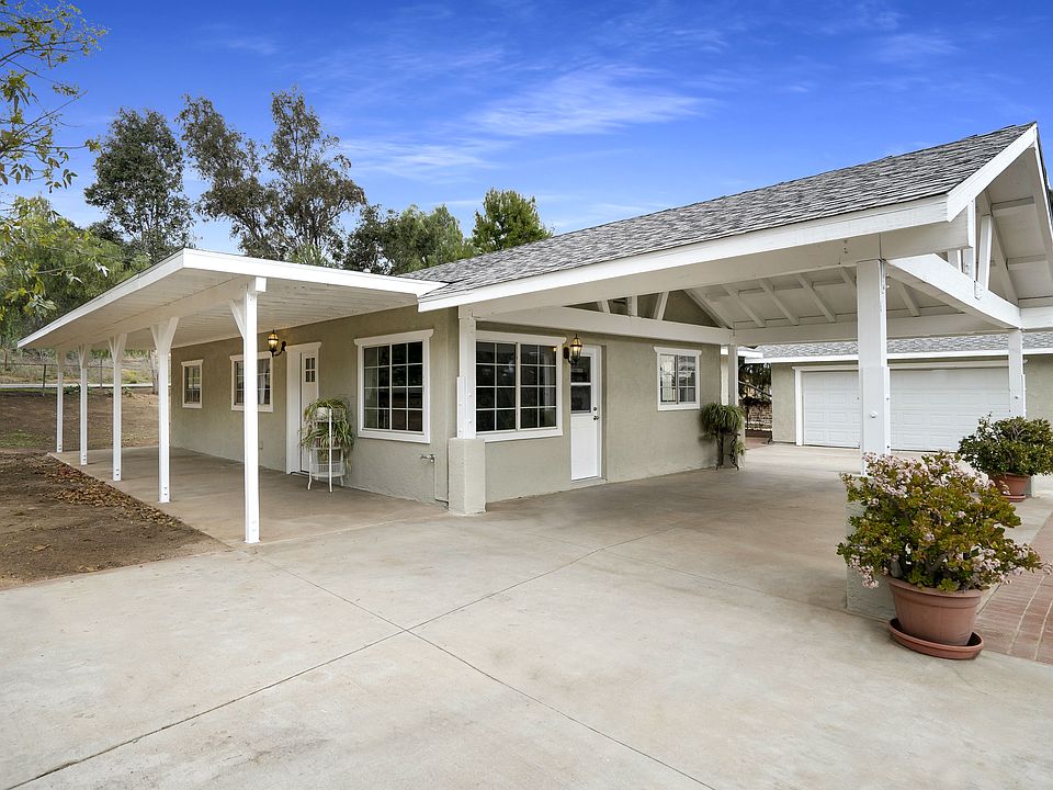 Large carport & 2-car garage