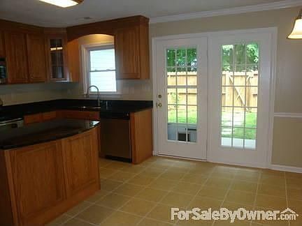 KITCHEN TO PATIO : BEAUTIFUL FRENCH DOORS TO COZY & PRIVATE PATIO.