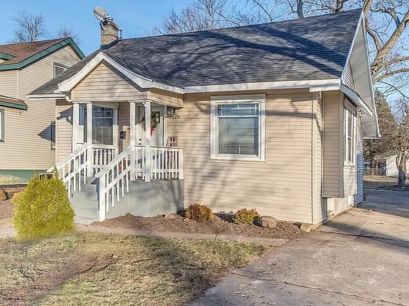 Front of House with Parking pad to the right