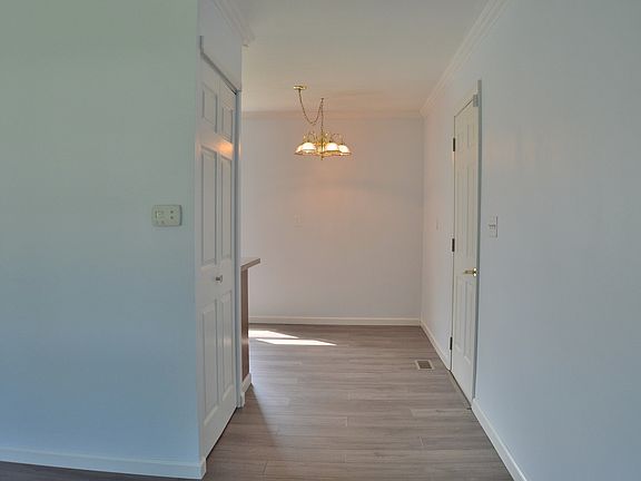 Living Room Opens to Kitchen Fresh paint in LR, DR, Hallway & Kitchen 09/2019 - Lots of closets for storage - pull down stairs to attic for light storage as well